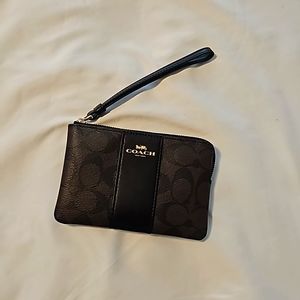 Brown and Black Coach Wristlet